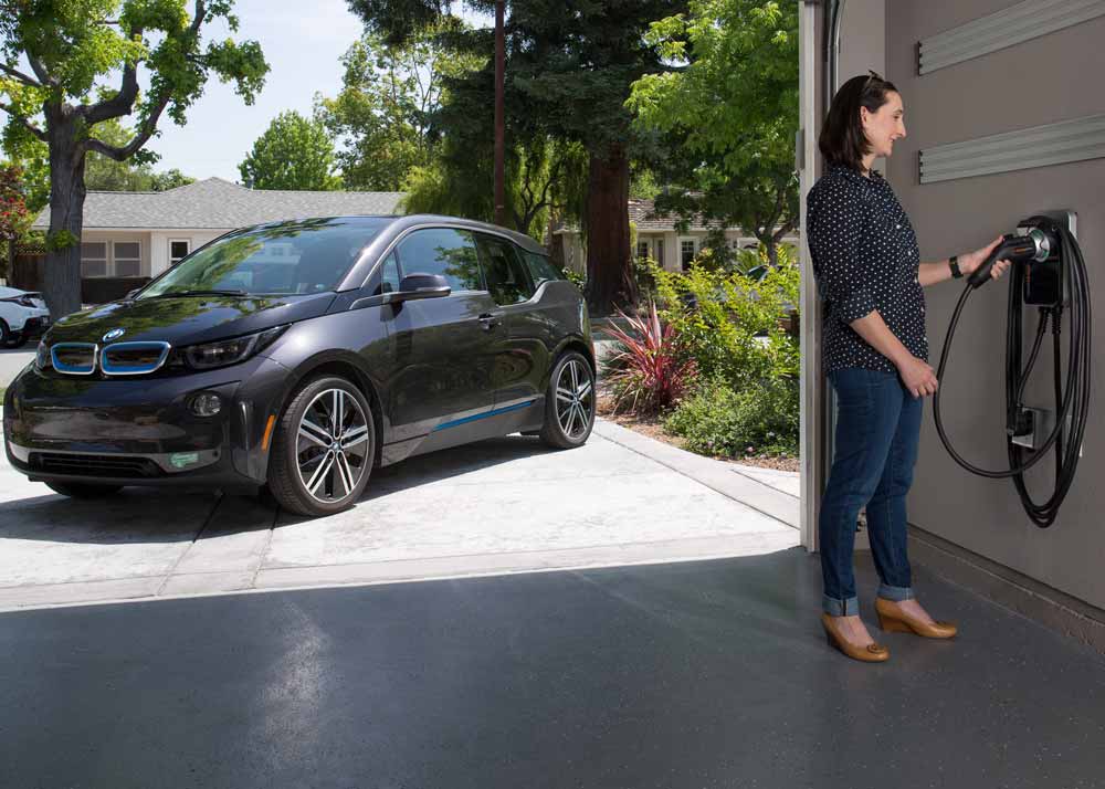 electric car charging station installation by Plugz - home charging station installed in garage
